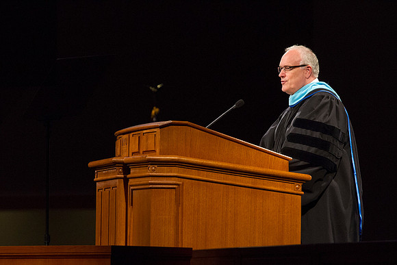 Elder Paul V. Johnson, Commissioner of The Church Educational System gives a few remarks during the 2015 April Commencement Ceremony.