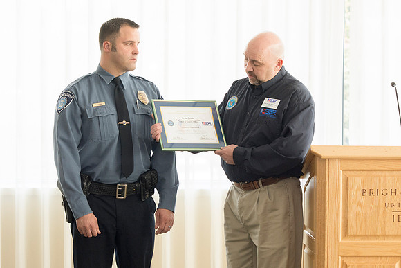 George Hames presenting the award to Bryan Lyons.