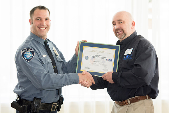 George Hames presenting the award to Bryan Lyons.