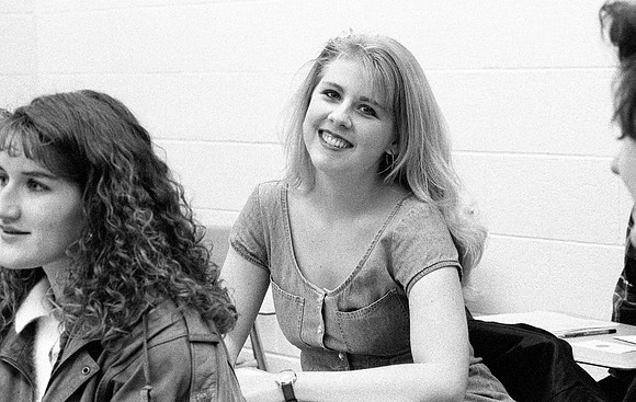 Students and teachers participating in an english class