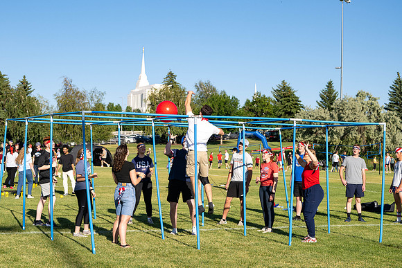 Students gather at the upper field for various 4th of July activities.