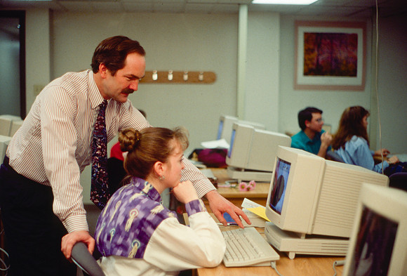 Byron John assists a student in the Agriculture Department.