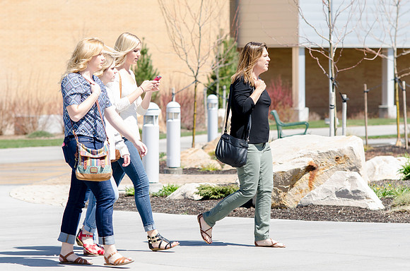 Spring semester 2015 begins with sunshine and blossoms. Students come back to school and look forward to summer in Rexburg. Photo by Erik Hill.