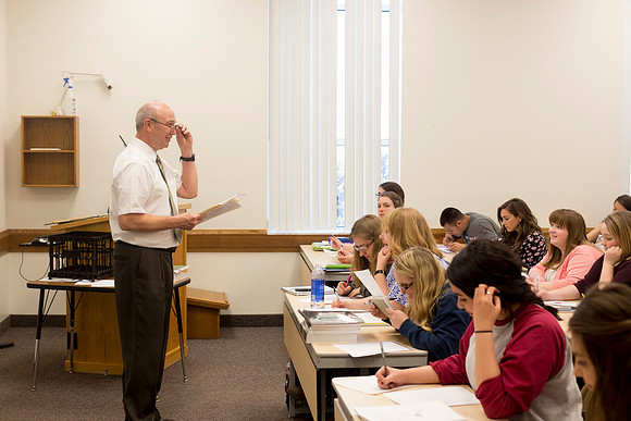 Brother Marion Johnstun Teaches his ED 334 class in the Hinckley Building.