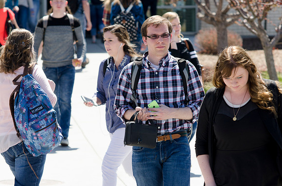 Spring semester 2015 begins with sunshine and blossoms. Students come back to school and look forward to summer in Rexburg. Photo by Erik Hill.