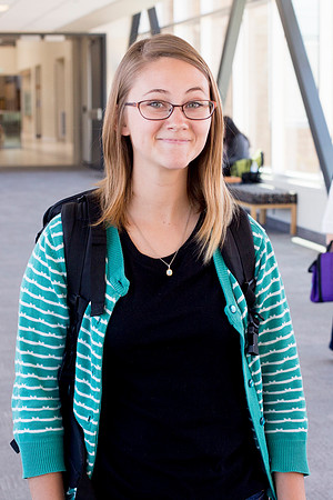 Janae Andrus on the Sky Bridge connecting the MC and the Library. Photo by Erik Hill.