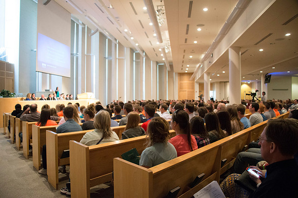 New students and their parents gather to listen to President and Sister Gilbert.