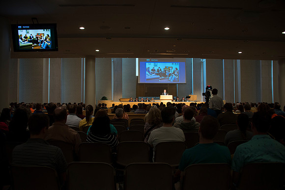President Gilbert speaks to new students and their parents.