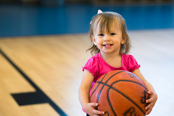 Daughter of a student plays basketball during Get Connected.