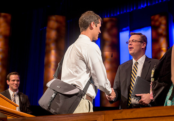 President Gilbert visits with Students after Devotional.