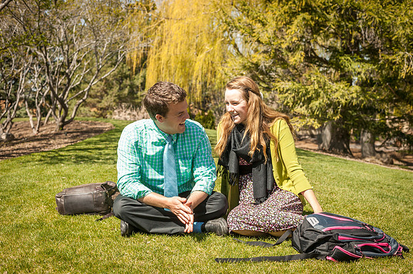 A newly engaged couple enjoy themselves in the gardens on the first day of the Spring Semester.