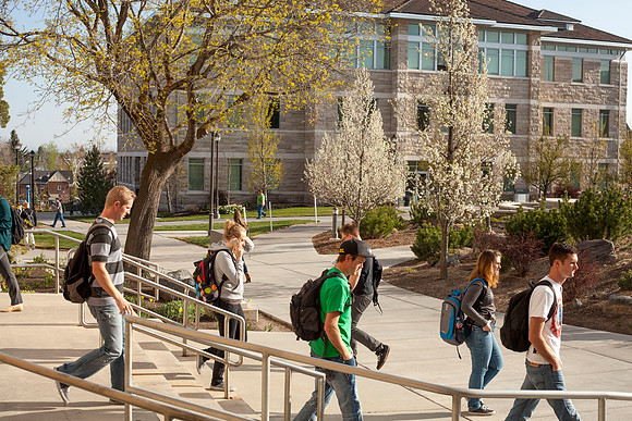 Students walk to and from the Romney Building on the second day of school during the Spring Semester.