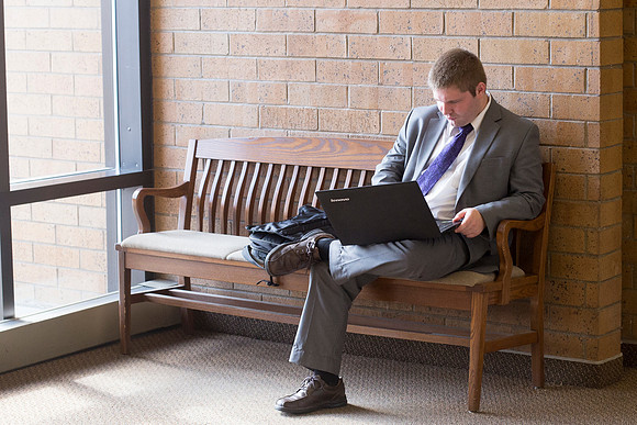 A student studies dilligently in the Snow Building.