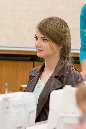 Students introduce themselves in Sister Julann Blake's sewing class.