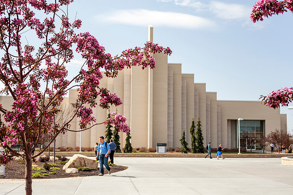 Students walk to and from classes in the Taylor Quad.
