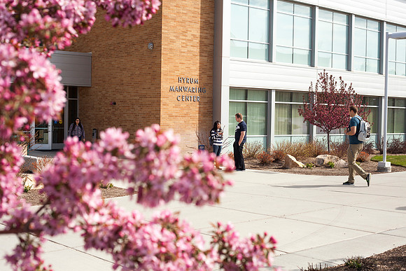 Two students talk outside the Manwaring Center during the first week of school.