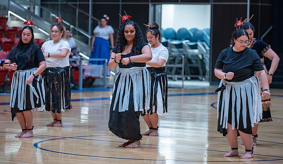 Students rehearsing for cultural night at the hart building.