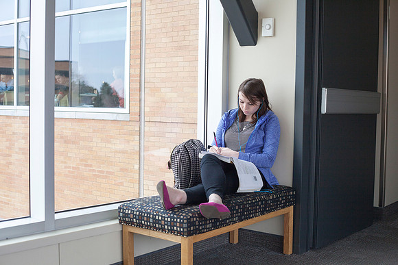 A student finds a quiet place to study on the BYU-I campus during finals week.