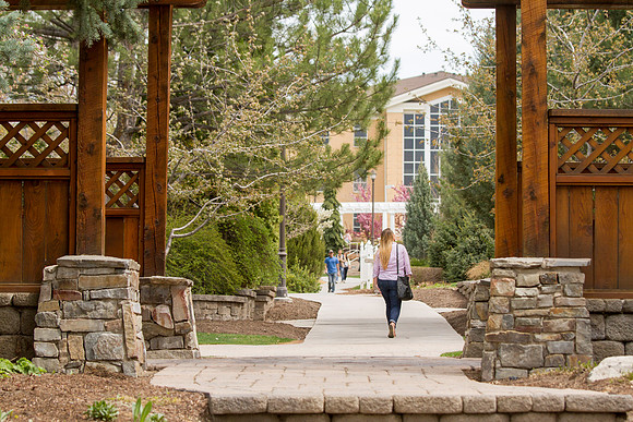 Students pass through the gardens after class on the first week of school, during the 2015 Spring Semester.