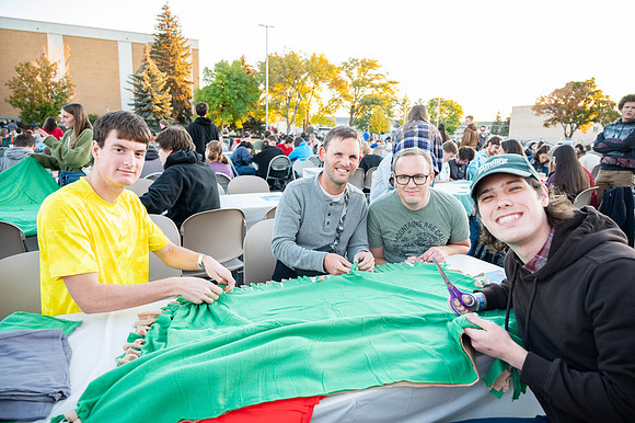 Students participating in the helping hands service night.