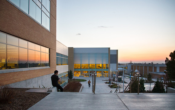 The sun sets over the I-Center as students walk into I-Night.