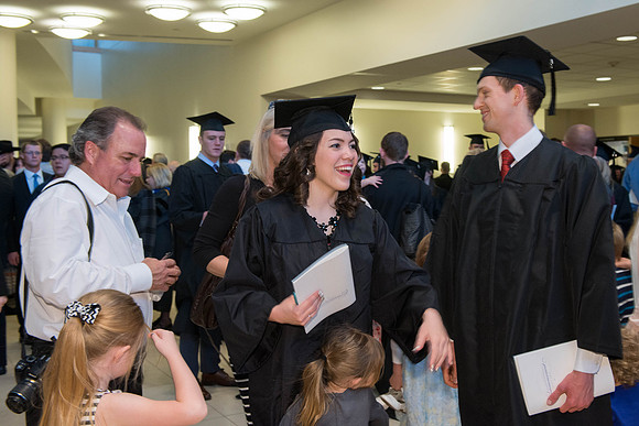 Gratuates with family and friends after the commencement ceremony. Photo by Ryan Chase