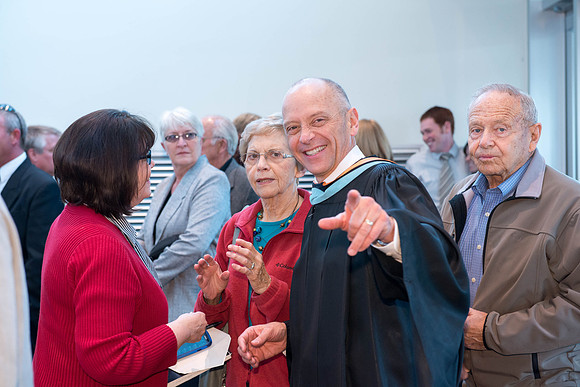 Faculty member Greg Palmer after the commencement ceremony.