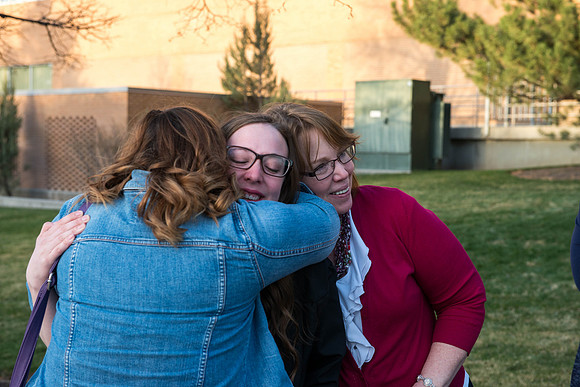 Gratuates with family and friends after the commencement ceremony. Photo by Ryan Chase