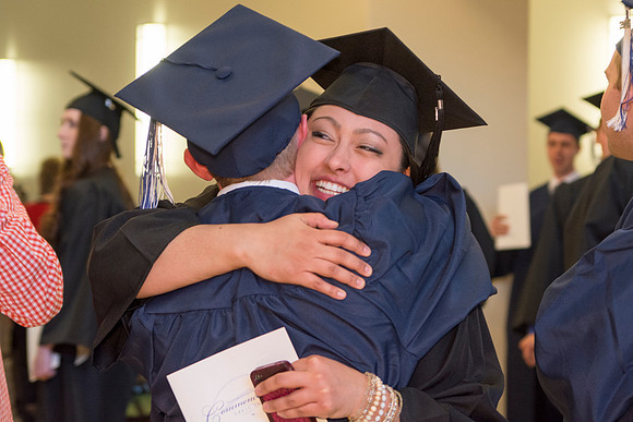 Brigham Young University-Idaho Graduates tour campus with their families saying goobyes to peers and getting pictures with friends and family before the convocation ceremonies. Photo by Ryan Chase