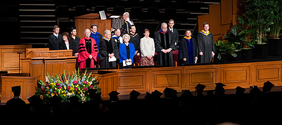 Winter 2012 Commencement, Elder M Russell Ballard, Pres. Clark, and faculty observe graduates entering during processional