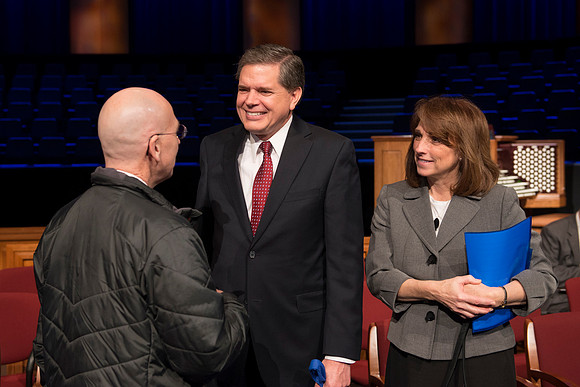 David L. Beck greets students after devotional in the BYU-Idaho Center.