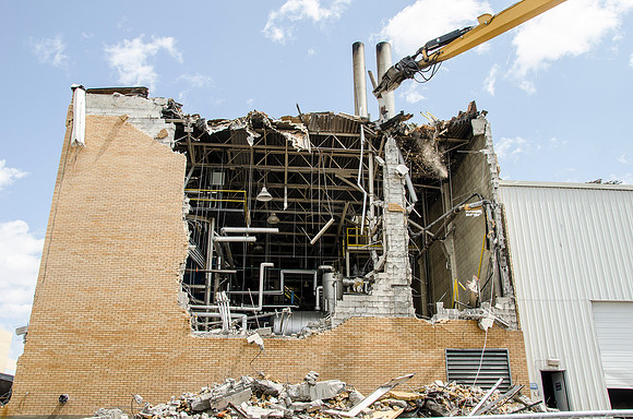 Demolition begins on the old part of the Heating Plant.