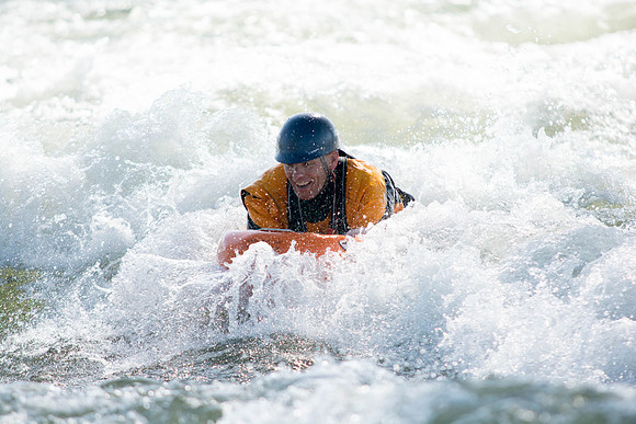 Students go riverboarding near Blackfoot, ID as a part of BYU-Idaho's Outdoor Activities.