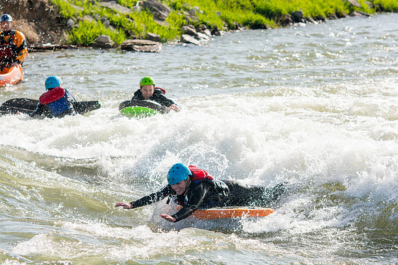 Students go riverboarding near Blackfoot, ID as a part of BYU-Idaho's Outdoor Activities.