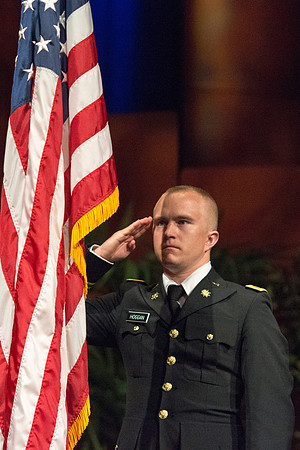 LT. Hoggan posts the colors to begin the commencement ceremony.