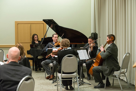 Eliza R. Snow Award members and guest enjoy an evening of god food and entertainment honoring Rick and Cheryl Hansen for their service towards the Arts.