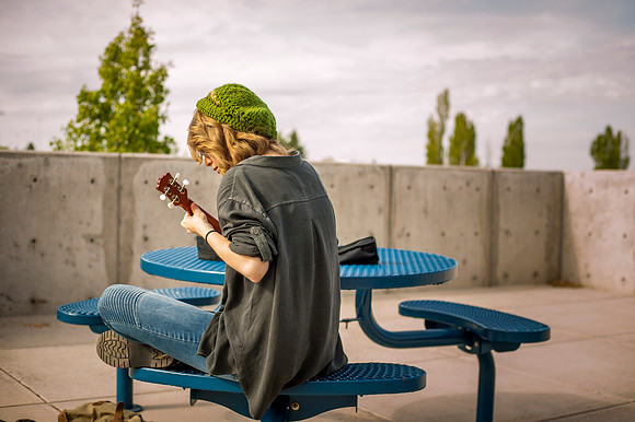 McKynna Van Wey finds a quiet moment in the morning to play her Uke.