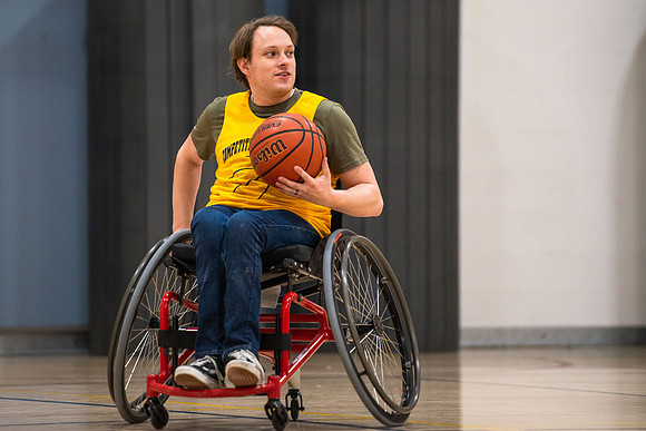 Students participate of Wheelchair Basketball in the Hart Gym.