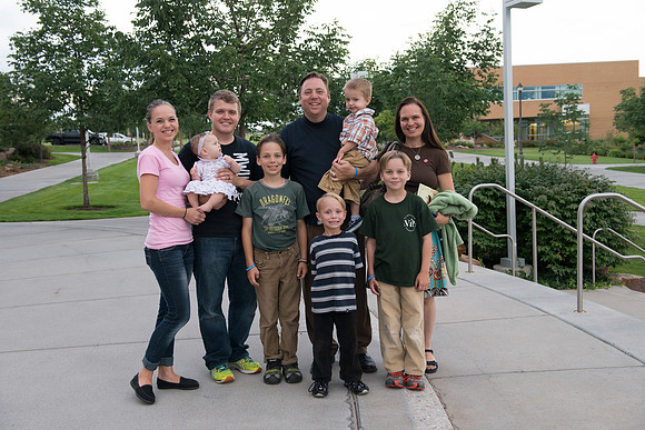Family gathers for a picture.
