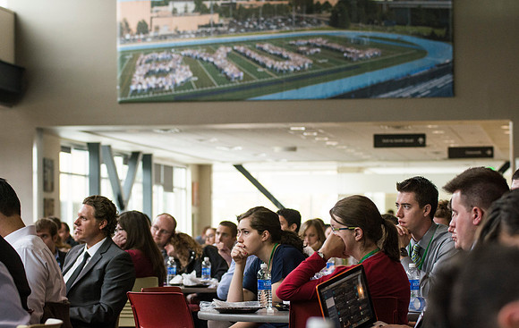 Students listen attentively during the closing speakers remarks.