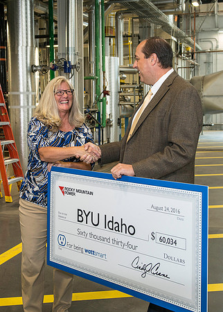 Rocky Mountain Power presents BYU-Idaho with a check for being Watt Smart. 2016