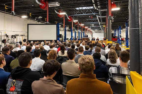 Dedication of the Engineering Technology Center, the Visual Arts Center and the University Village Community Center originated from the automotive shop in the ETC.