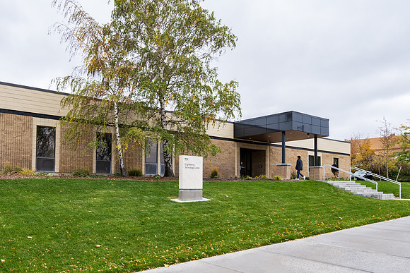 Dedication of the Engineering Technology Center, the Visual Arts Center and the University Village Community Center originated from the automotive shop in the ETC.