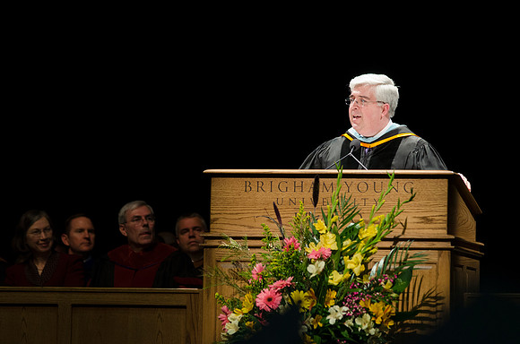 Elder Teixeria of the Europe Area Presidency address graduates during the Convocation of the College of Business and Communication in the Hart Auditorium.