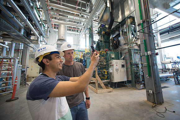 Construction Management Interns Natza Salinas and Matt Brower.