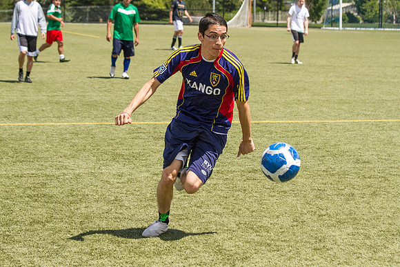 A player from the Latino Association goes for the ball during the World Cup Soccer Tournament.