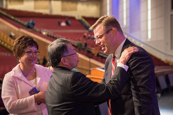 VP Pres kevin Myasaki congratulates Clark Gilbet on his new assignment as President of BYU-Idaho. BYU-Idaho photo by Michael Lewis