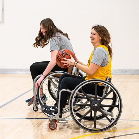 Students participate of Wheelchair Basketball in the Hart Gym.