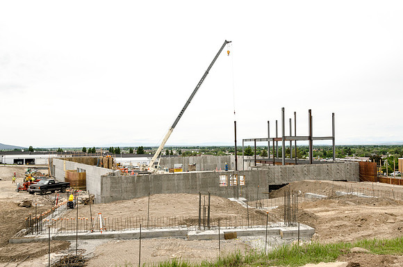 Construction continues on the new Science and Techonology Building. The installation of the iron work provides the neccesary structure for additional floors.