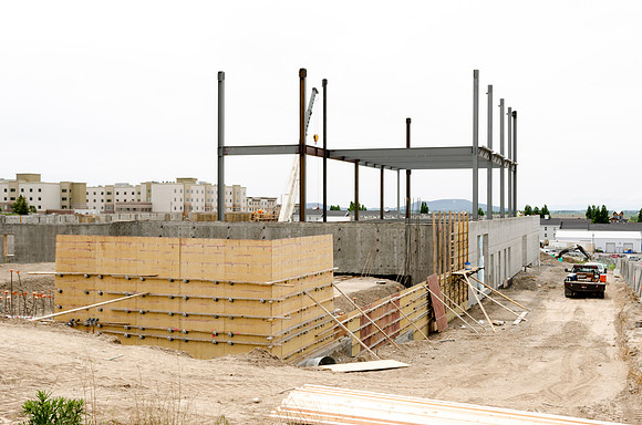 Construction continues on the new Science and Techonology Building. The installation of the iron work provides the neccesary structure for additional floors.